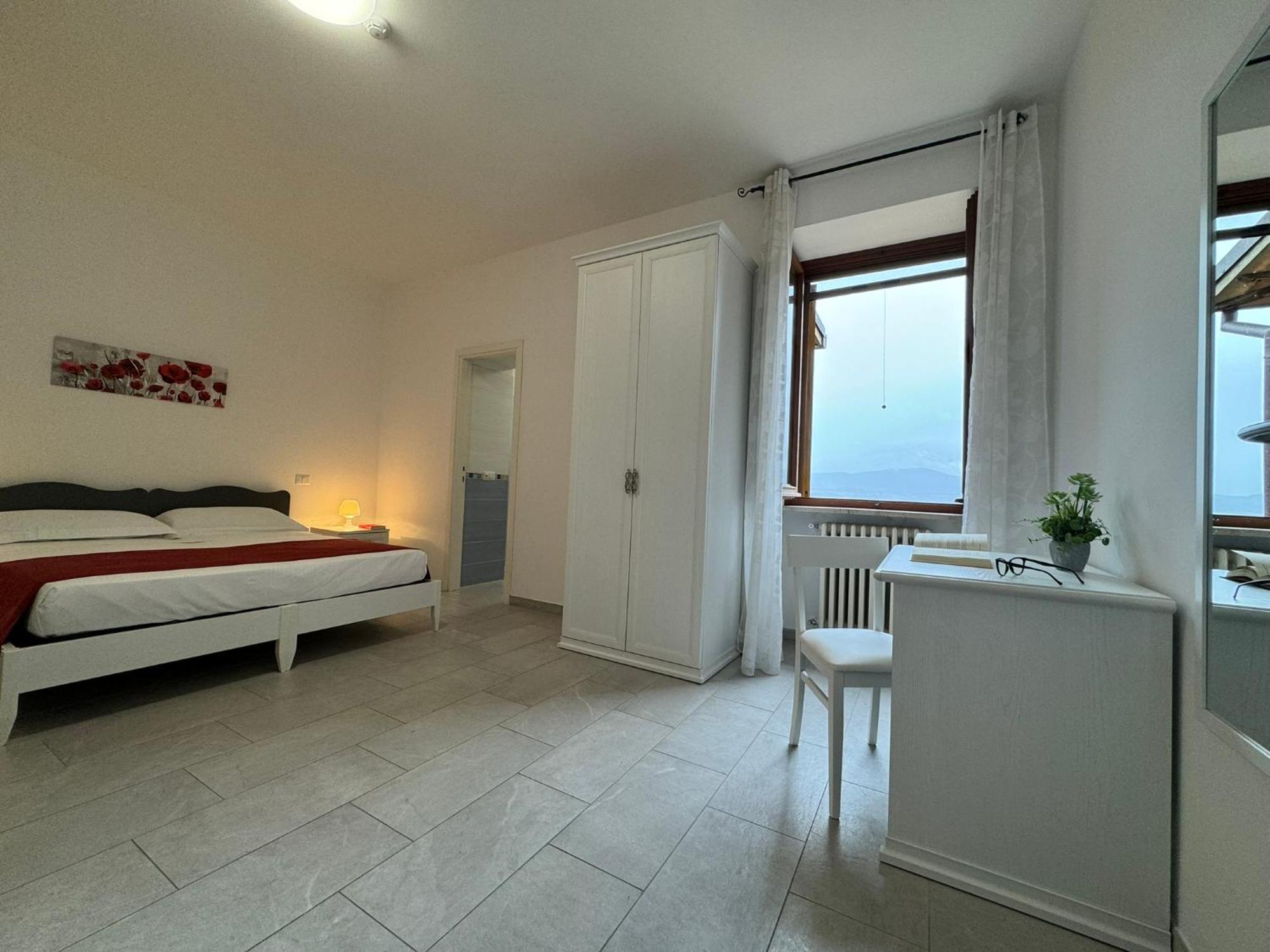 Hotel Monastero Ss. Annunziata Todi Exterior foto A room at the hotel
