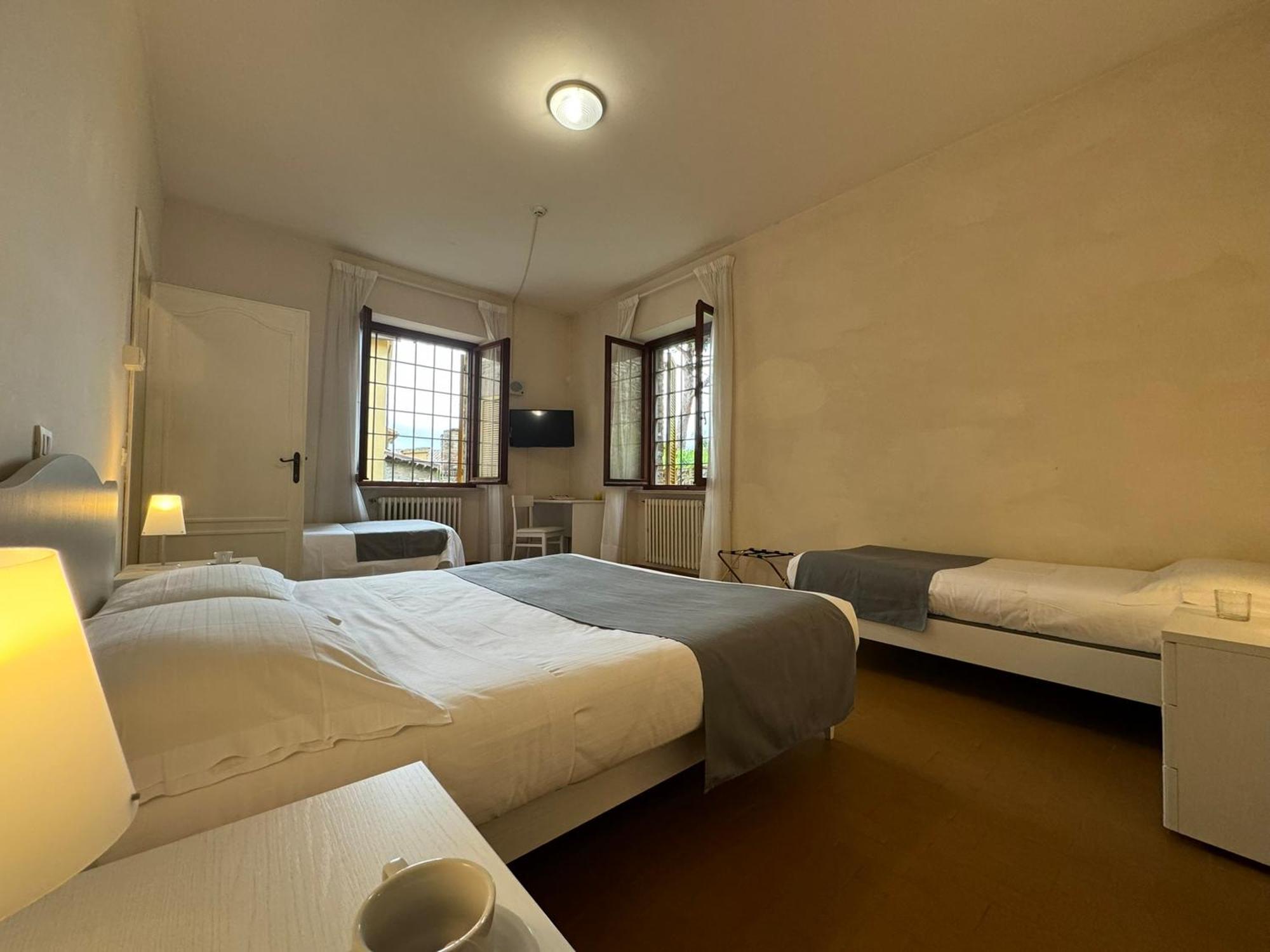 Hotel Monastero Ss. Annunziata Todi Exterior foto A room at the hotel