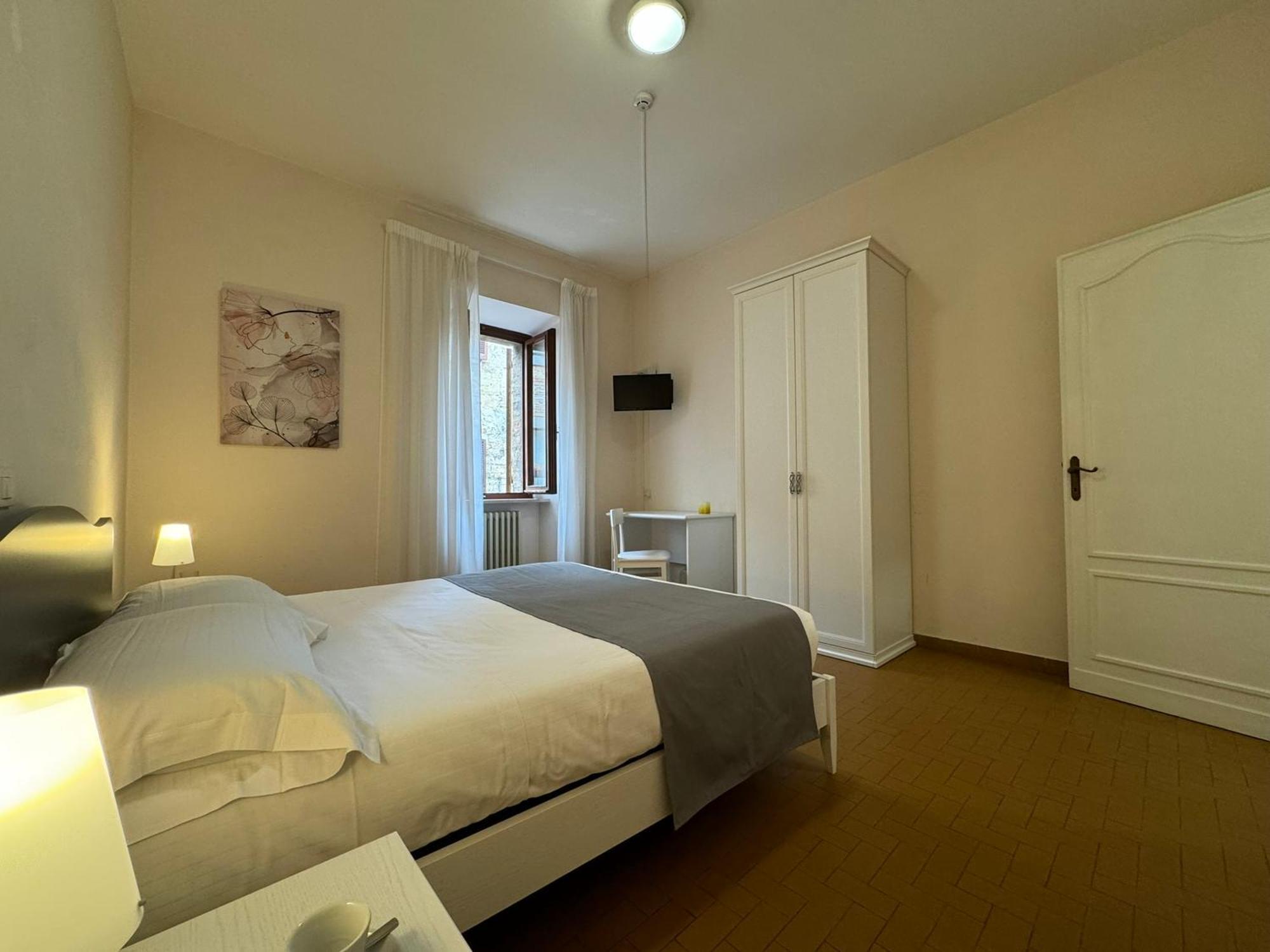 Hotel Monastero Ss. Annunziata Todi Exterior foto A room at the hotel