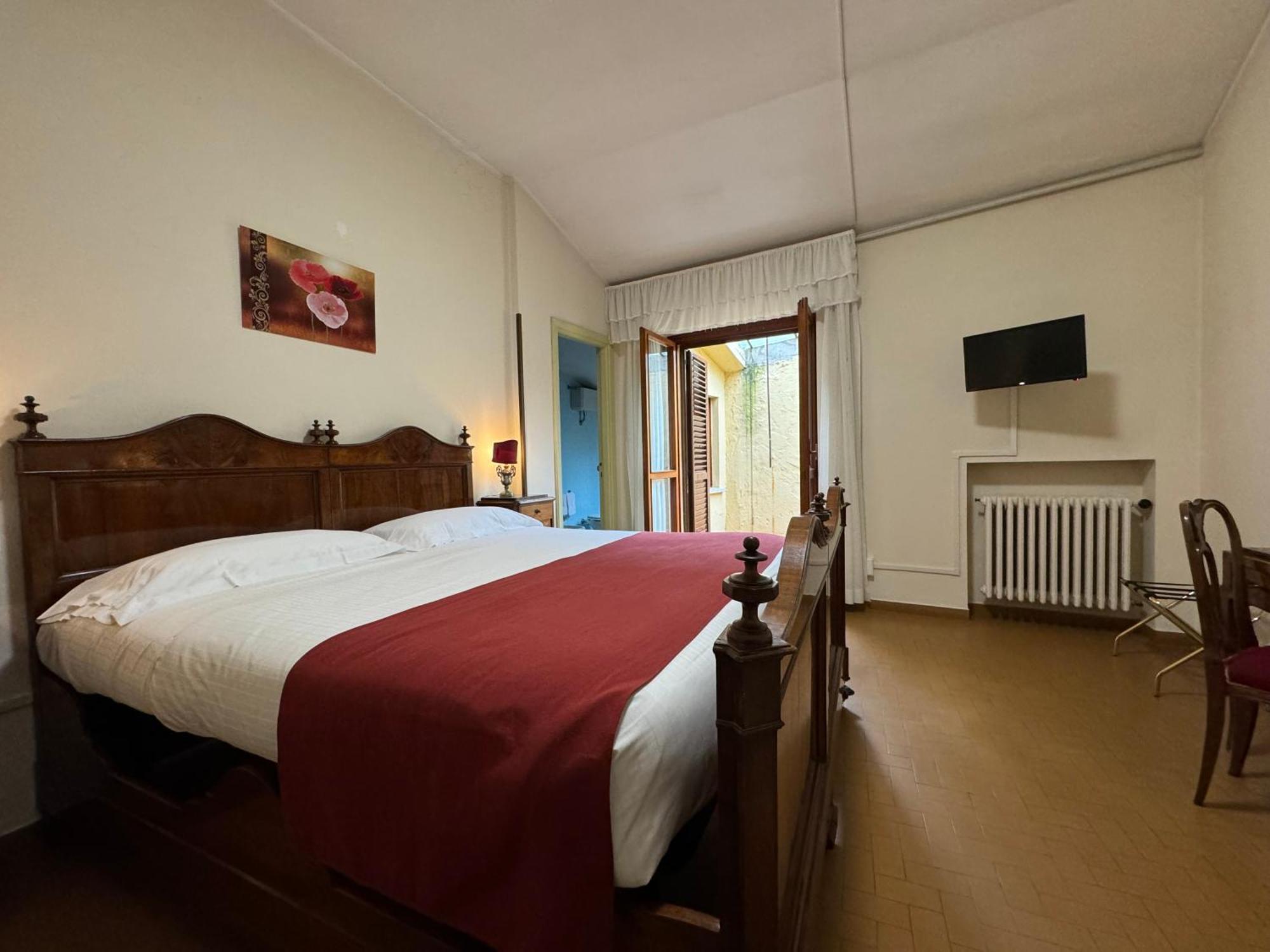 Hotel Monastero Ss. Annunziata Todi Exterior foto A room at the hotel