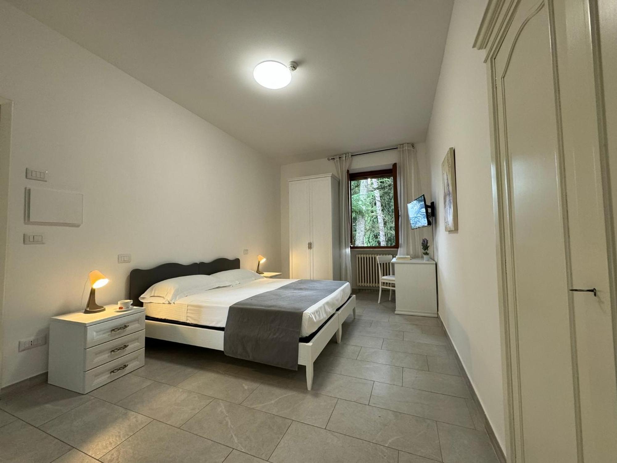 Hotel Monastero Ss. Annunziata Todi Exterior foto A room at the hotel