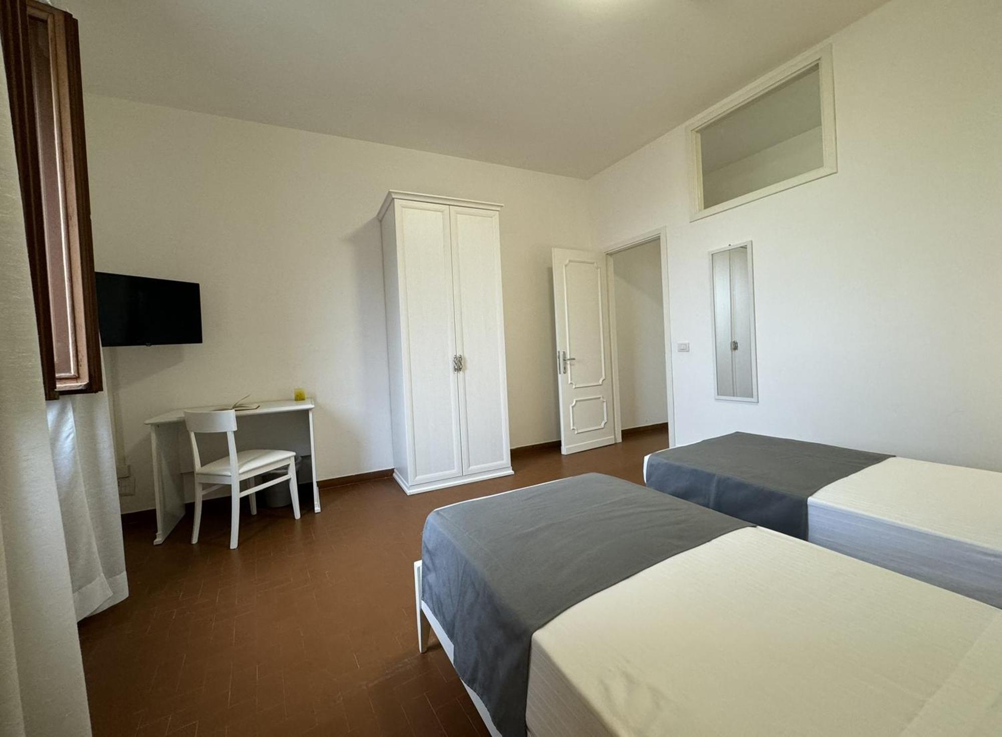 Hotel Monastero Ss. Annunziata Todi Exterior foto A room at the hostel