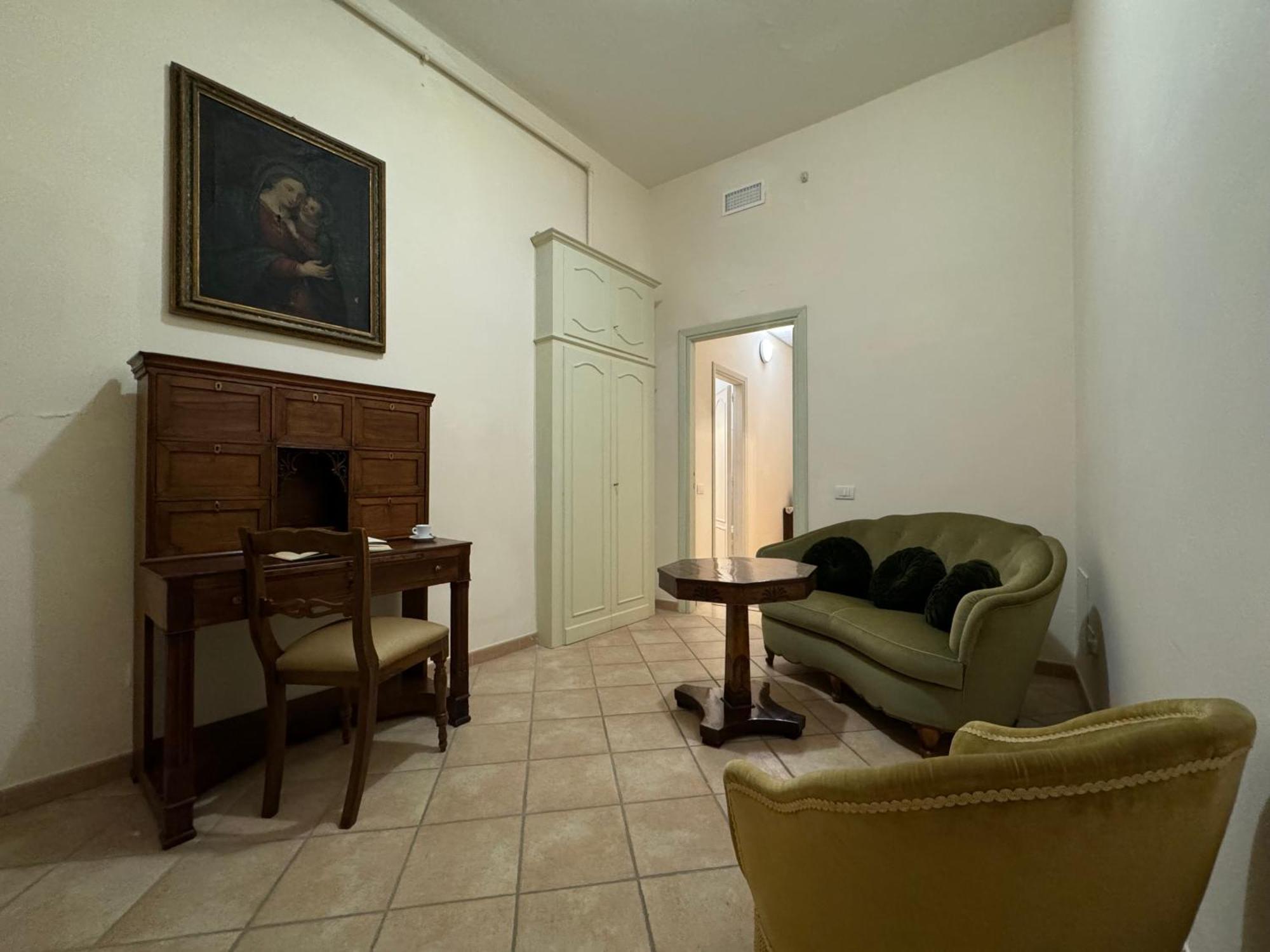 Hotel Monastero Ss. Annunziata Todi Exterior foto The living room of the apartment