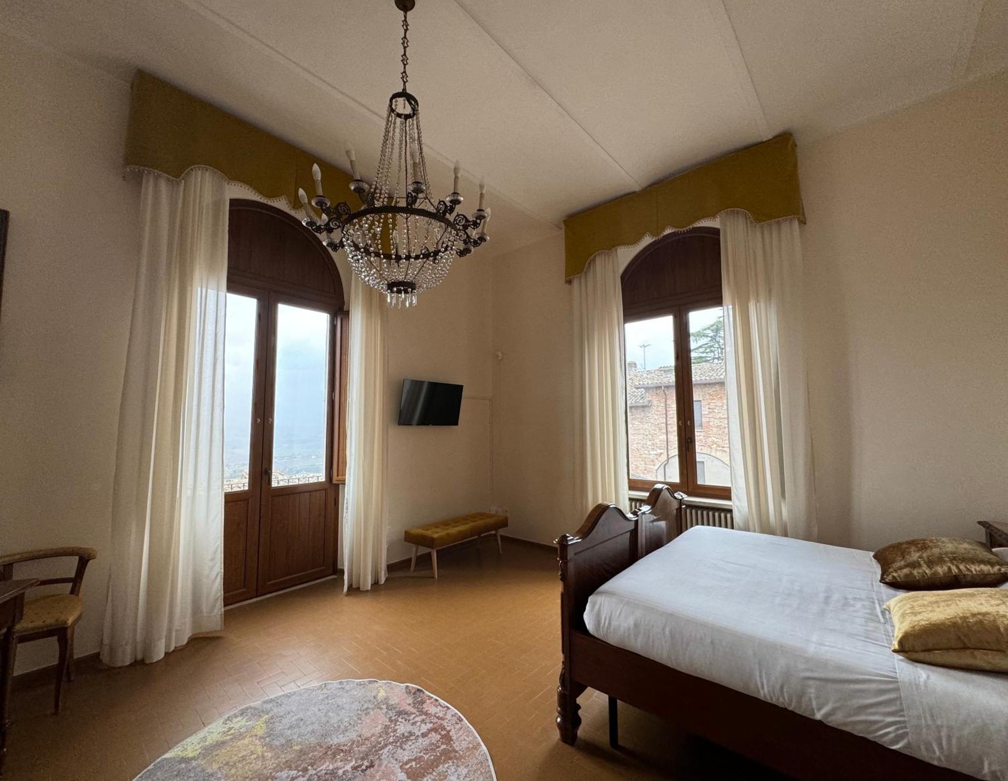 Hotel Monastero Ss. Annunziata Todi Exterior foto A room at the hotel