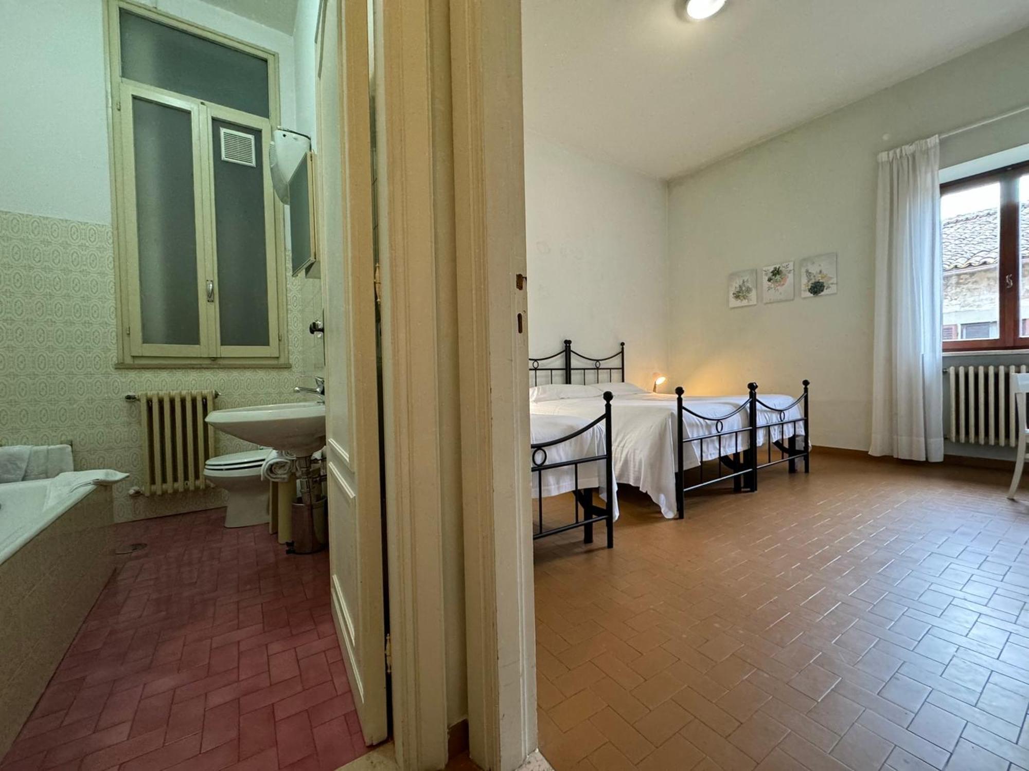 Hotel Monastero Ss. Annunziata Todi Habitación foto A typical room at the San Pio X Seminary