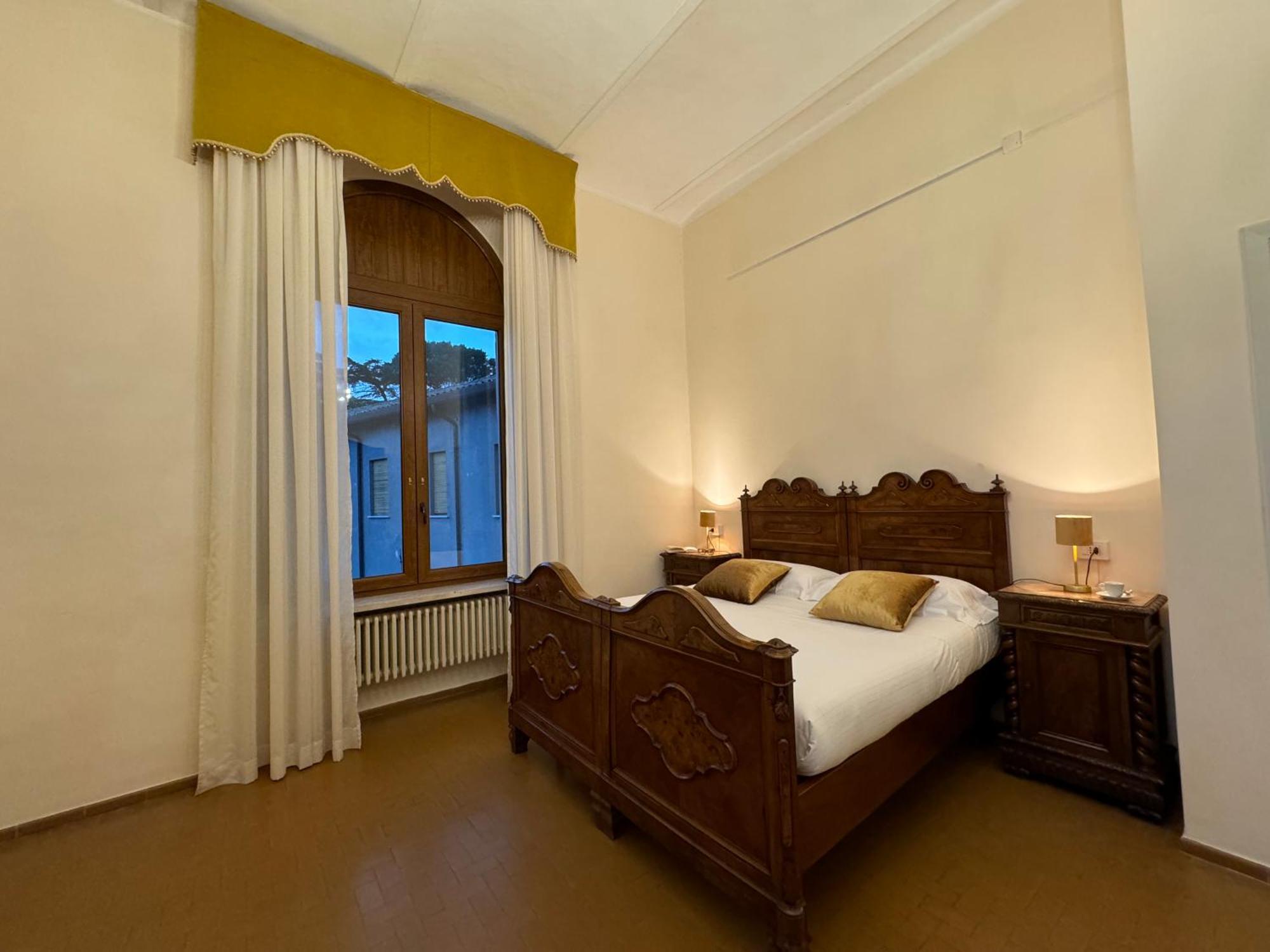 Hotel Monastero Ss. Annunziata Todi Exterior foto A room at the hotel